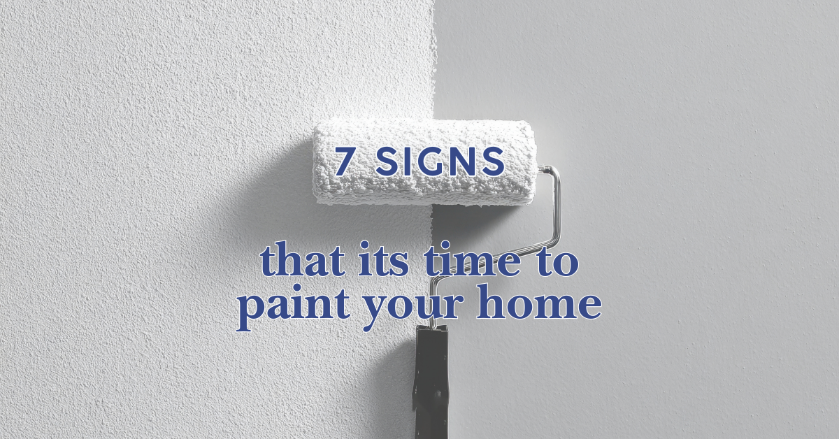 A paint roller covers a wall, with half painted white and half light gray. Text on the image reads, "7 SIGNS that its time to paint your home.