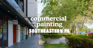 A sidewalk lined with modern commercial buildings, trees, and parked cars. Bold text over the image reads, "commercial painting SOUTHEASTERN PA.